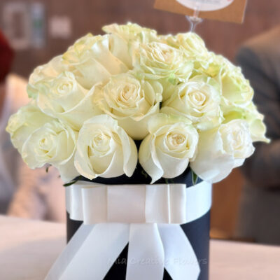 White Roses in A Black Box.